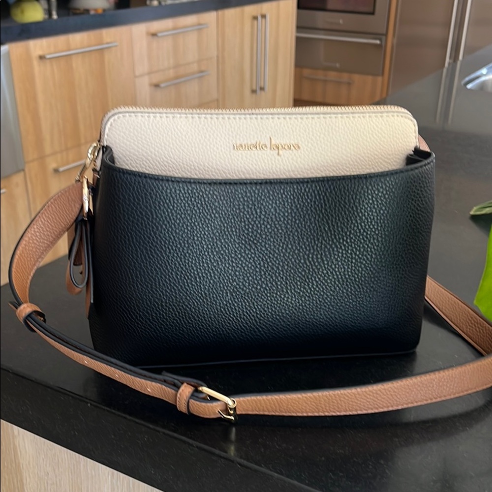 Elegant Black and Tan Crossbody Bag